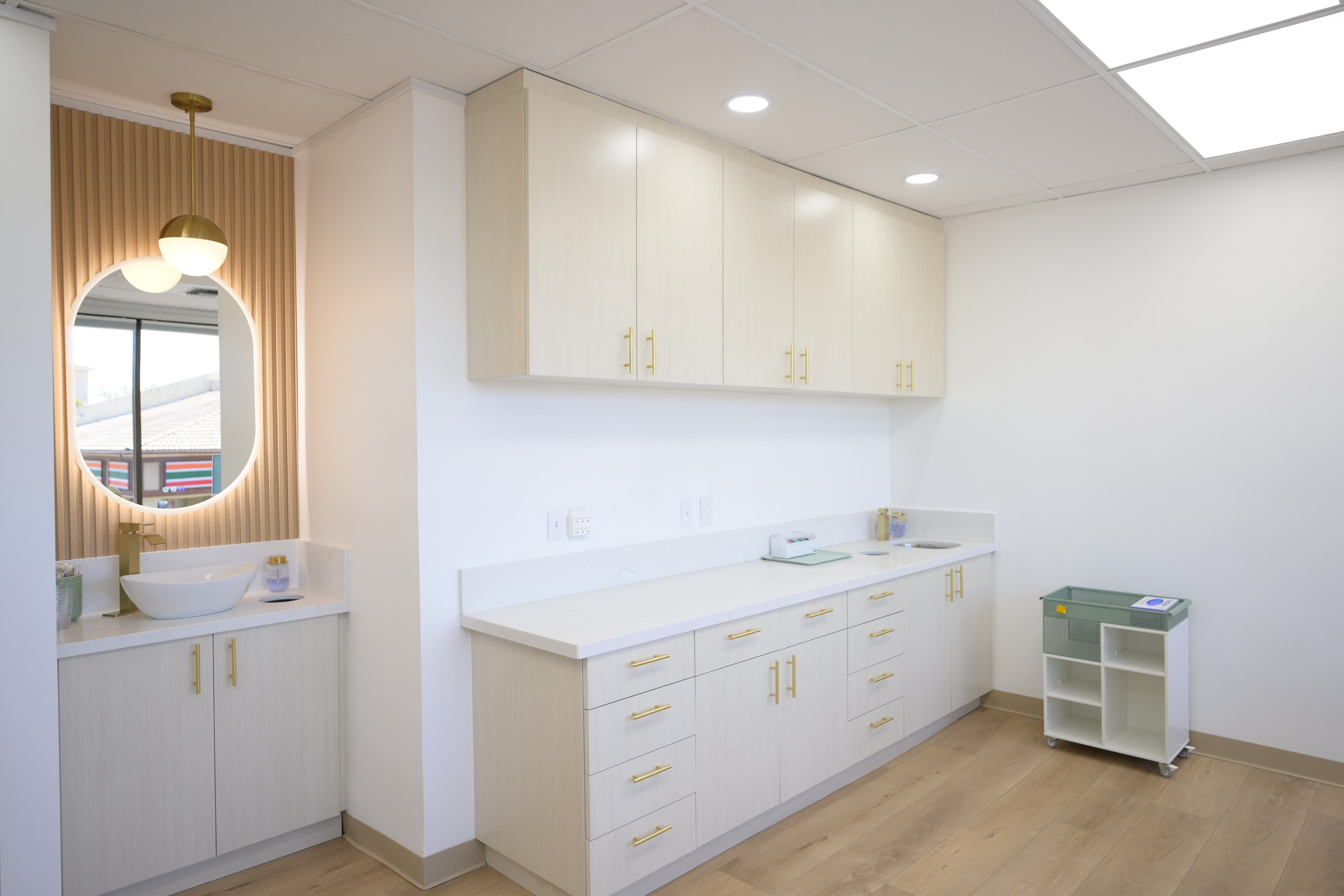 Bright clinic cabinetry and brushing station